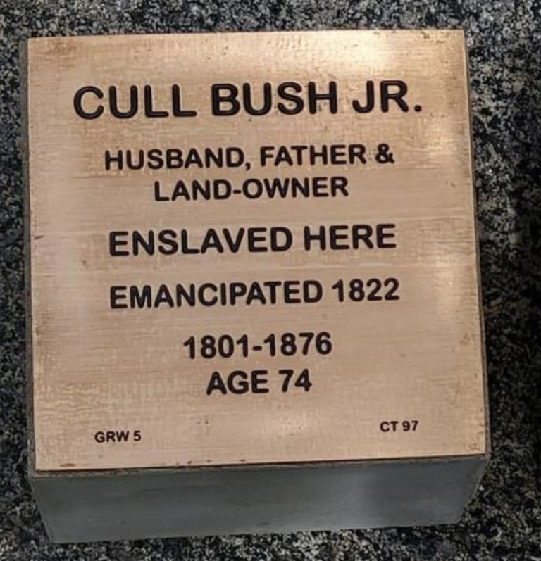 Plaque honoring Cull Bush Jr., former enslaved person and landowner, emancipated in 1822, lived 1801-1876.