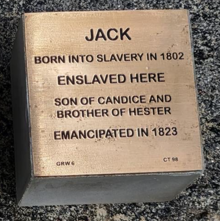 Plaque honoring Jack, enslaved in 1802, son of Candice, brother of Hester, emancipated in 1823.