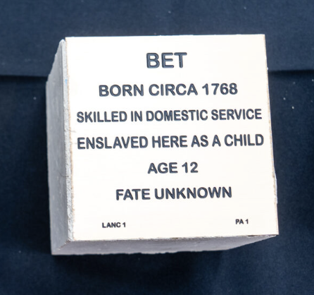 Commemorative block for Bet: domestic service, enslaved aged 12, born circa 1768, fate unknown.