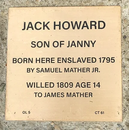 Commemorative plaque for Jack Howard, born enslaved in 1795, detailing his life and transfer in 1809.