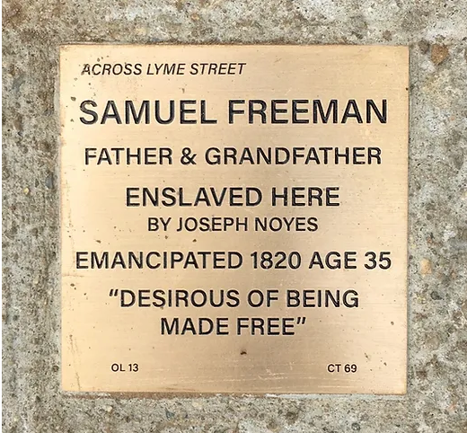 Plaque honoring Samuel Freeman, enslaved by Joseph Noyes, emancipated in 1820 at age 35, expressing desire for freedom.